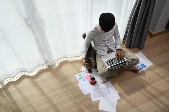 A morning routine planner on a desk with a to-do list and an alarm clock