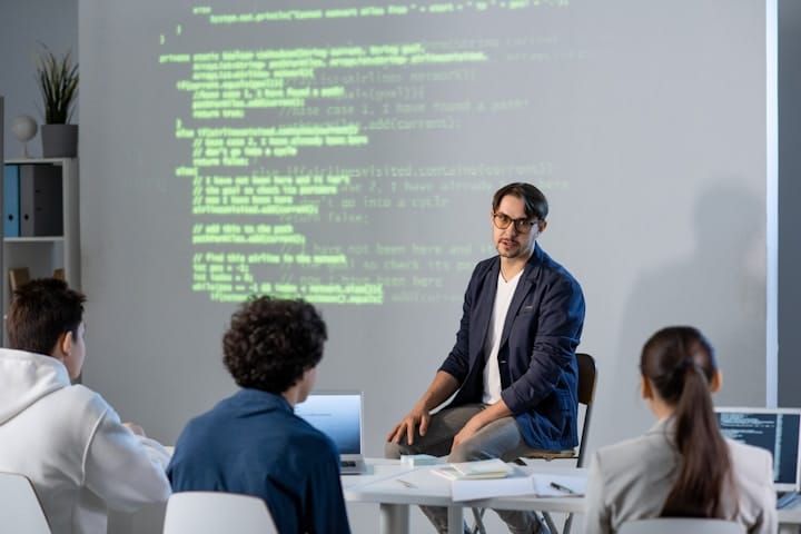 A team of professionals conducting a cybersecurity meeting