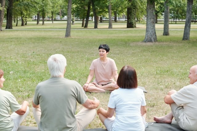 An illustration depicting a leader engaging in mindfulness practices such as meditation