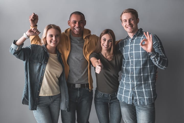 Diverse Group of People Giving Thumbs Up