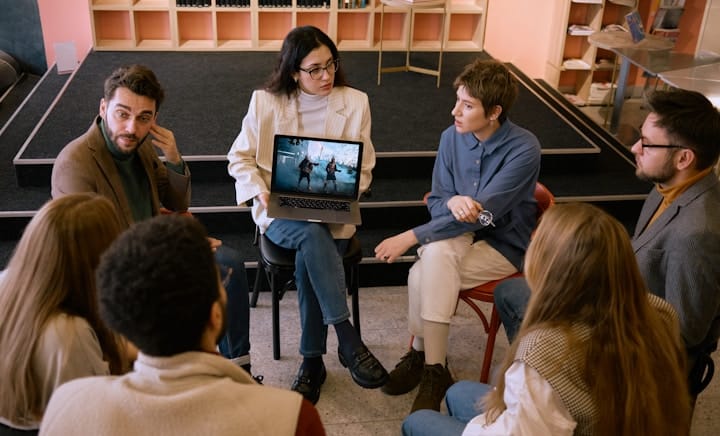 Group of individuals watching an engaging visual presentation