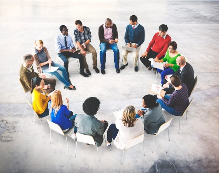 Group of Diverse People Engaged in Market Research