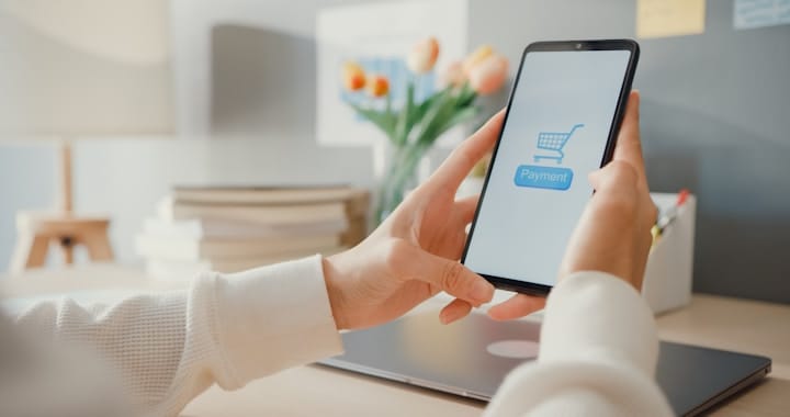 Happy Shopper Using Smartphone for Online Shopping