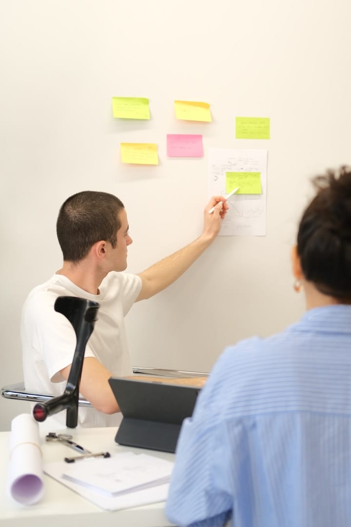 A team reviewing their project goals and responsibilities on a collaborative digital platform