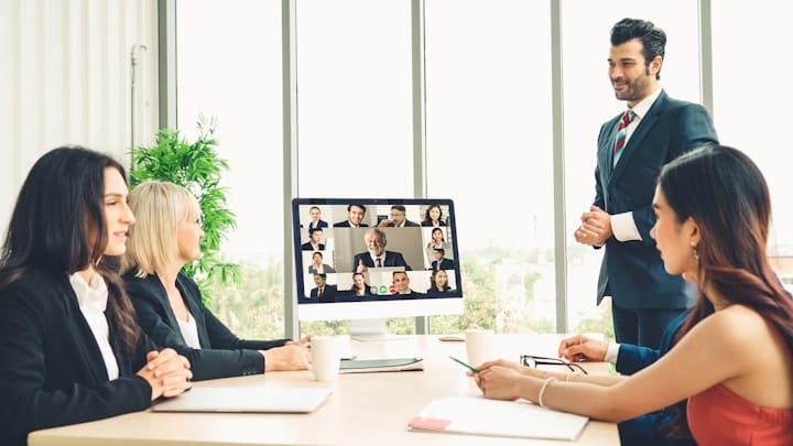 Team meeting via video with diverse members participating