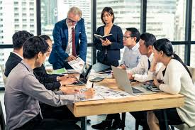 A team discussing performance metrics during a review session