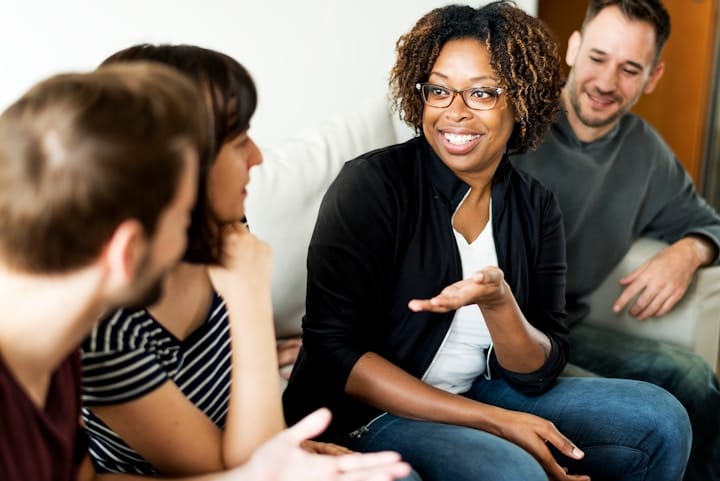 Group of Diverse People Engaging in Conversation