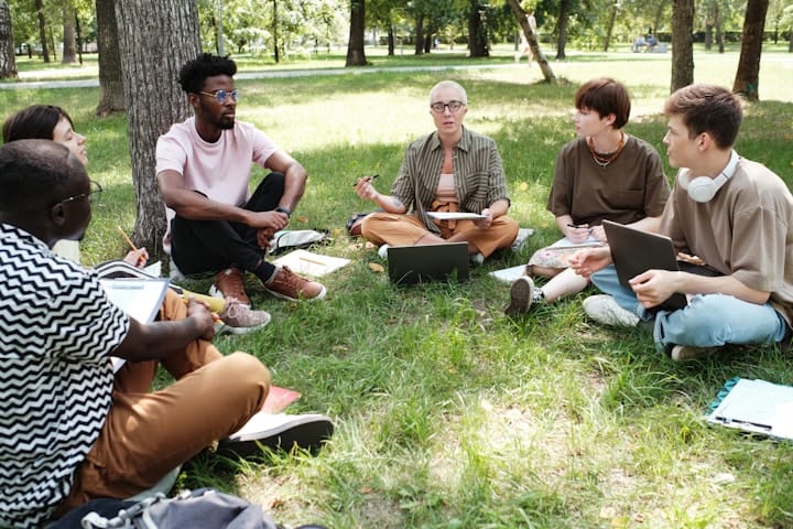 Diverse Group of People Sharing Stories