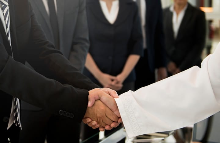 Diverse Business People Shaking Hands