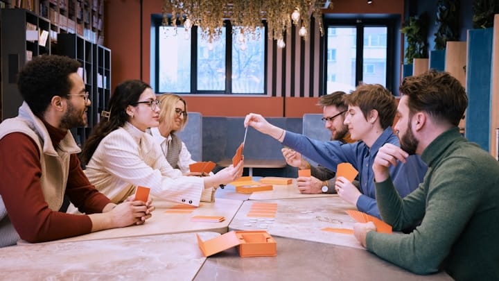 Team Meeting Around Conference Table